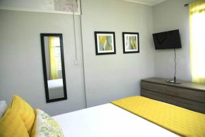 Ένα ή περισσότερα κρεβάτια σε δωμάτιο στο Chez Crix