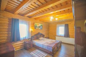 Postel nebo postele na pokoji v ubytování Guest House Podobovets 2000 + 37 fotografií