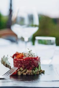 a plate of food on a table with a fork at Villa Castiglione in Impruneta