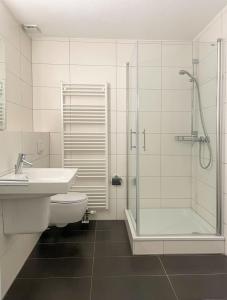 Ένα μπάνιο στο Ferienwohnung Steuerbord Hunde erlaubt