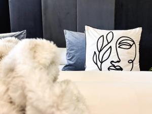 Łóżko lub łóżka w pokoju w obiekcie Boutique Hotel Pinzgauerhof