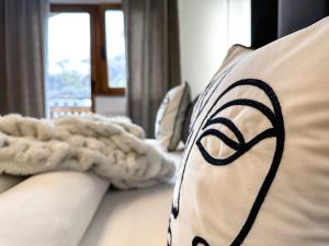 Łóżko lub łóżka w pokoju w obiekcie Boutique Hotel Pinzgauerhof