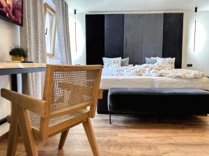 Łóżko lub łóżka w pokoju w obiekcie Boutique Hotel Pinzgauerhof
