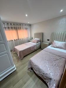 Appartement vue sur mer - Calabonita客房内的一张或多张床位