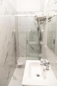 Koupelna v ubytování Albergo Athena + 34 fotografií