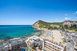 a view of a beach and the ocean at Atalaya Beach Apartments Sea View in Finestrat