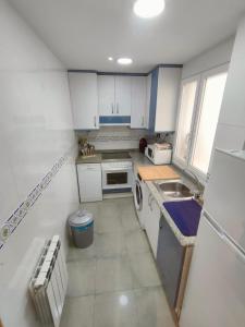 A kitchen or kitchenette at Tirwal Suite San Juan