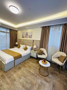 Postel nebo postele na pokoji v ubytování Calm Corner Addis + 35 fotografií