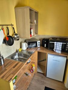 Ett kök eller pentry på 17A DB Airbnb