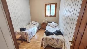 Posteľ alebo postele v izbe v ubytovaní Apartament El Pla