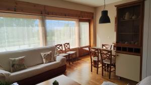 Posedenie v ubytovaní Apartament El Pla