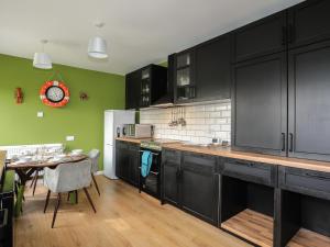 Kuchyň nebo kuchyňský kout v ubytování Greenfield