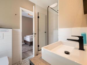 Koupelna v ubytování Hotel am Schlosspark garni