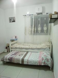 Una cama o camas en una habitación de Sun&sea