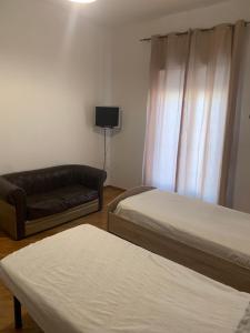 Postel nebo postele na pokoji v ubytování Casa Alighieri