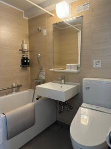 Ένα μπάνιο στο the one ueno