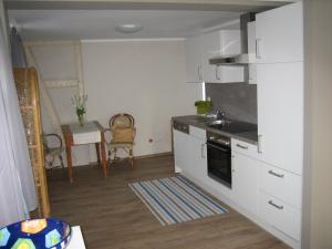 Kuchyň nebo kuchyňský kout v ubytování Gemütliche Kleine Wohnung