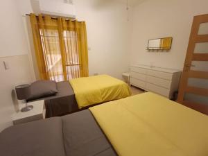 Postel nebo postele na pokoji v ubytování Maisonette JP2