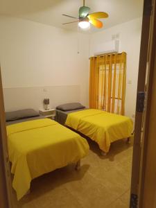 Postel nebo postele na pokoji v ubytování Maisonette JP2