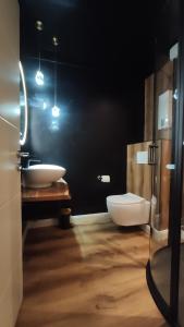 Et badeværelse på Xenos Apartment