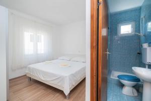 Koupelna v ubytování Apartment Ljuba + 30 fotografií