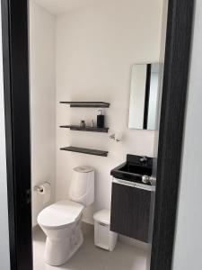 Koupelna v ubytování Hermoso apartamento con Aire Acondicionado Cerca al Hospital de Neiva