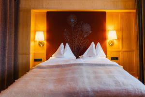Postel nebo postele na pokoji v ubytování Boutique-Hotel Schmelzhof