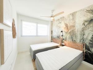 Ένα ή περισσότερα κρεβάτια σε δωμάτιο στο Manilva del Sol SEA VIEW PENTHOUSE