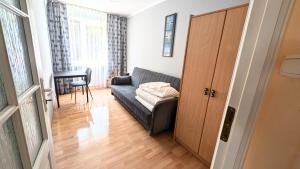 Posteľ alebo postele v izbe v ubytovaní Apartament Piernikowe Serce