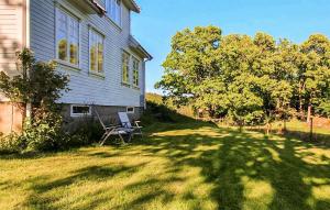 Κήπος έξω από το 4 Bedroom Nice Home In Lyngdal +10 φωτογραφίες