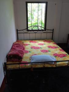 Ένα ή περισσότερα κρεβάτια σε δωμάτιο στο Ankita Residential Homestay