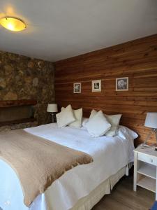 Postel nebo postele na pokoji v ubytování Hotel Boutique Terra Diaguita & Spa