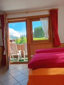 Posteľ alebo postele v izbe v ubytovaní Chalet Beatrice