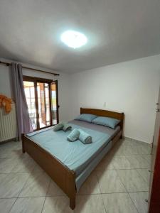 Postel nebo postele na pokoji v ubytování Maison Olga