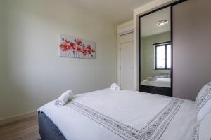 Letto o letti in una camera di Libera Luxe Residence