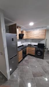 Kuchyň nebo kuchyňský kout v ubytování Apartamentos solymar oropesa del mar