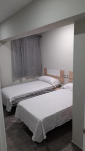 Postel nebo postele na pokoji v ubytování Apartamentos solymar oropesa del mar