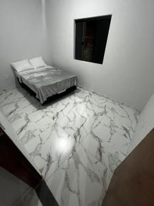 Ένα ή περισσότερα κρεβάτια σε δωμάτιο στο Casa sucupira