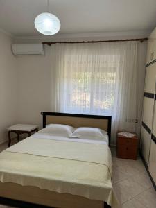 Postel nebo postele na pokoji v ubytování Isaraj Guest House + 21 fotografií