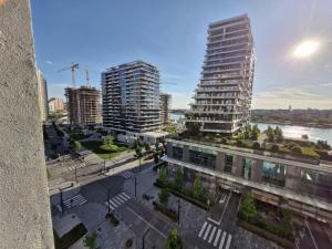 Vista generica su Sajmište o vista sulla città dall'interno dell'appartamento