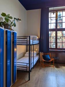 Voodi või voodid majutusasutuse RYNEK 30 Hostel toas +37 fotot
