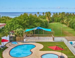 Bazén v ubytování Casa de Playa Hatillo nebo v jeho okolí
