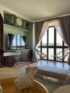TV a/nebo společenská místnost v ubytování NN Apartamento + 19 fotografií