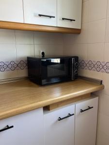 Kuchyň nebo kuchyňský kout v ubytování NN Apartamento