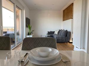 Ein Sitzbereich in der Unterkunft Little Penthouse