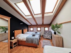 Posteľ alebo postele v izbe v ubytovaní Otium Old Town Boutique