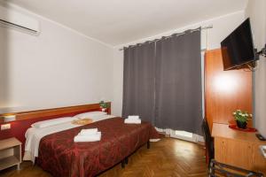Postel nebo postele na pokoji v ubytování Villa Gioia