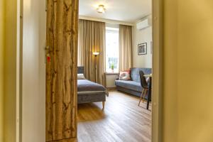 Postel nebo postele na pokoji v ubytování New! Warsaw Center Boya Apartments