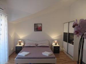 Cama o camas de una habitación en Apartments Petar