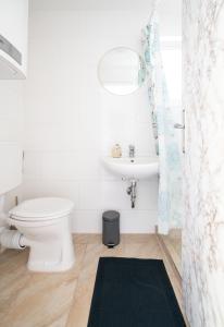 Koupelna v ubytování revLIVING Apartments Gars am Kamp + 37 fotografií
